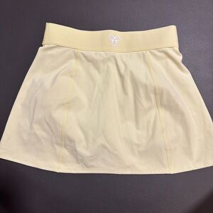 Aritzia micro court skirt lemonade yellow